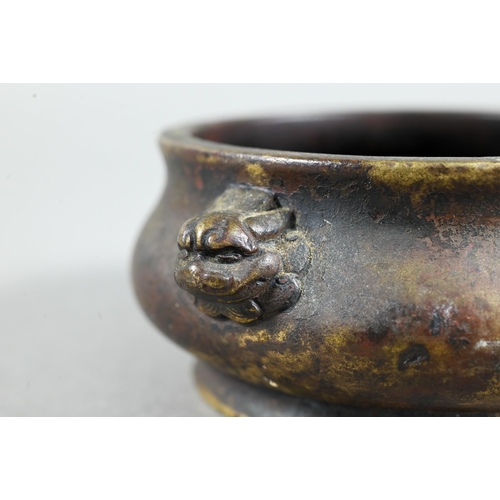 459 - An 18th/19th century Chinese gilt bronze censer or compressed globular form on circular foot cast wi... 