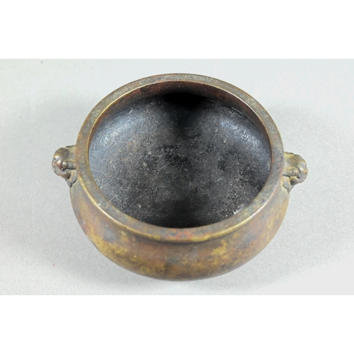 459 - An 18th/19th century Chinese gilt bronze censer or compressed globular form on circular foot cast wi... 