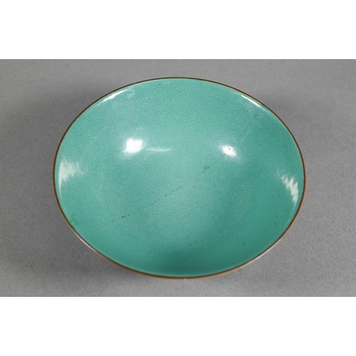 460 - An 18th century Chinese sea-green monochrome bowl with covered with a finely crackled glaze, brown d... 