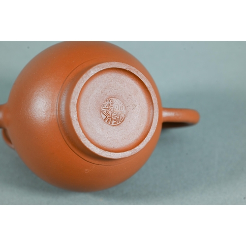 466 - A vintage Chinese Yixing teapot and cover with relief moulded prunus decoration, circa 1970, seal ma... 