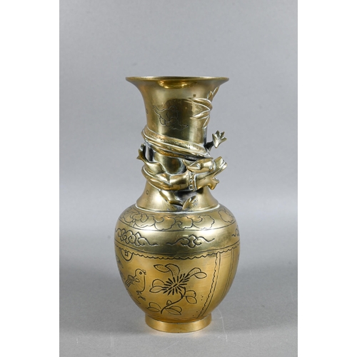 468 - A vintage Chinese brass vase engraved with birds and flowers with high relief dragon encircling the ... 