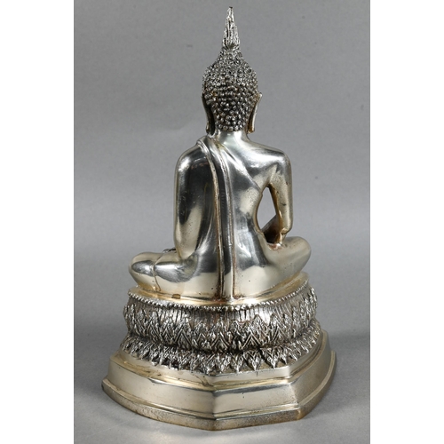 471 - A 20th century silvered base-metal Thai figure of Shakyamuni Buddha with hands in the meditation pos... 