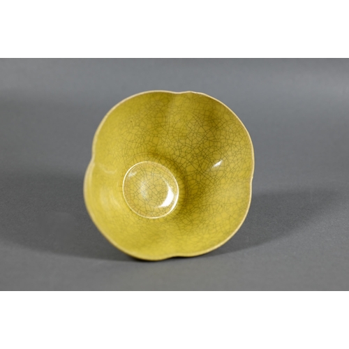 476 - A 20th century Chinese Ge style yellow quatrafoil bowl evenly covered with a finely crackled lemon y... 