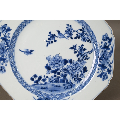 479 - An 18th century Chinese blue and white octagonal plate painted in tones of underglaze blue with two ... 