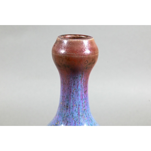 487 - A Chinese Jun style yao bian (transmutation glaze) garlic head vase with buff speckled streaky purpl... 