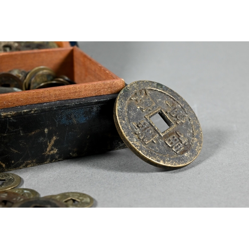 488 - Approximately one hundred and seventy antique and later Chinese cash coins (qian) mostly Qing dynast... 