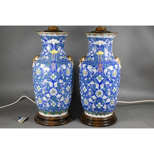 490 - A pair of 19th century Chinese 'longevity' vases painted with shou symbols and floral designs in pol... 