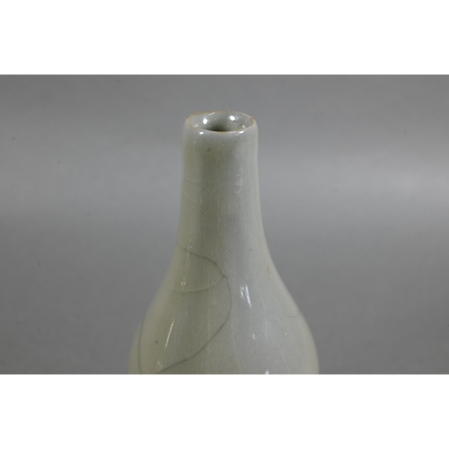 495 - A Chinese Ge ware style double gourd vase, the pale grey glaze with networks of darker grey crackles... 