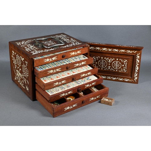 499 - A Chinese Mah Jong set, the hardwood and bone inlaid case with two carry handles and sliding front p... 