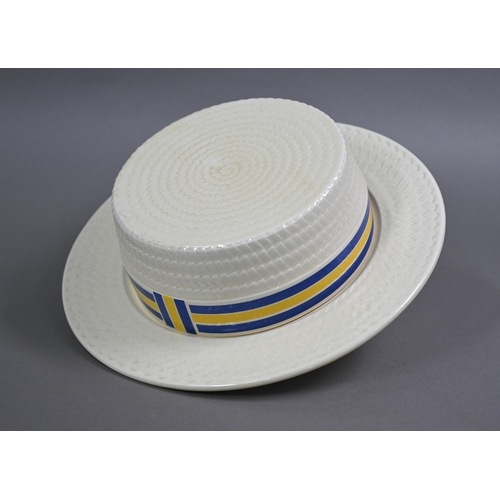50 - The 'Cheese Boater', a 1930s earthenware cheese dish and cover modelled as a boater hat with a blue ... 