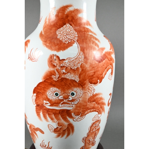 515 - A Chinese red and white baluster vase (mounted as a lamp on hardwood stand) painted in iron red enam... 