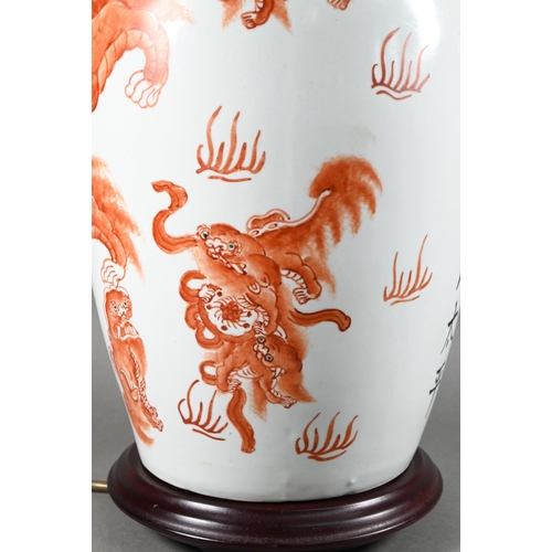 515 - A Chinese red and white baluster vase (mounted as a lamp on hardwood stand) painted in iron red enam... 