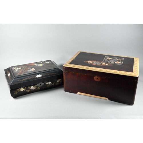 516 - An early 20th century Japanese black lacquered box with hinged cover decorated with birds and flower... 