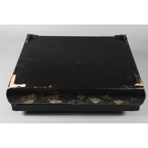 516 - An early 20th century Japanese black lacquered box with hinged cover decorated with birds and flower... 