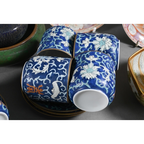 518 - A mixed box of Asian ceramics and collectables including a pair of 18th century Chinese famille rose... 