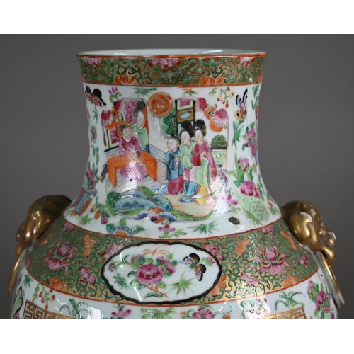 519 - A large 19th Century Cantonese porcelain baluster vase, decorated in the famille rose palette with c... 