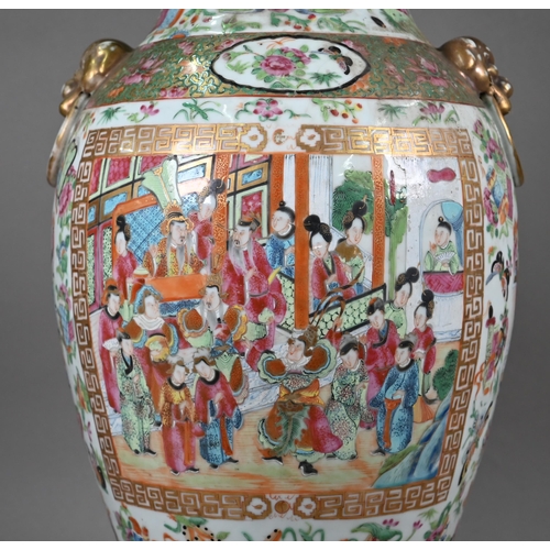 519 - A large 19th Century Cantonese porcelain baluster vase, decorated in the famille rose palette with c... 