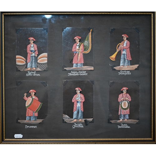 526 - A set of twenty-four Indian paintings on mica, depicting servants and musicians, mounted in four fra... 