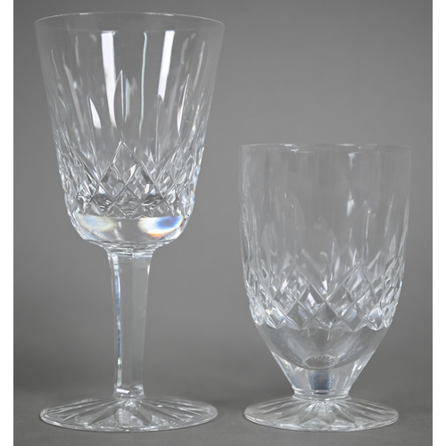 533 - A boxed set of six Waterford 'Lismore' white wine glasses and six juice glasses (2 boxes)