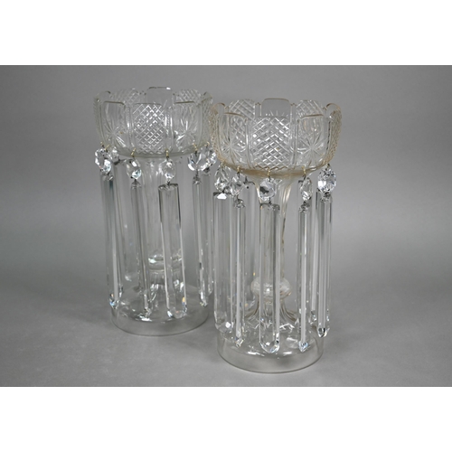 535 - A large pair of cut glass vases, hung with facetted beads and lustres, on hollow knop stems with dom... 