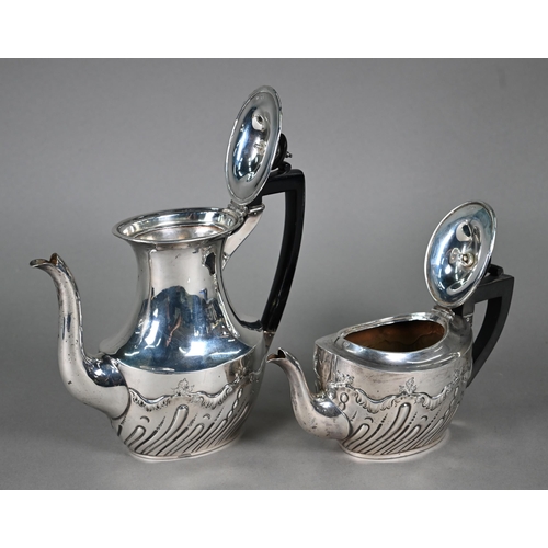 54 - A late Victorian silver tea pot and coffee pot with composite handles and ebonised finials, James De... 