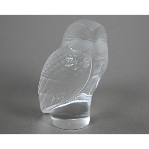 549 - A Lalique glass owl, engraved script 'Lalique ® France', 9cm