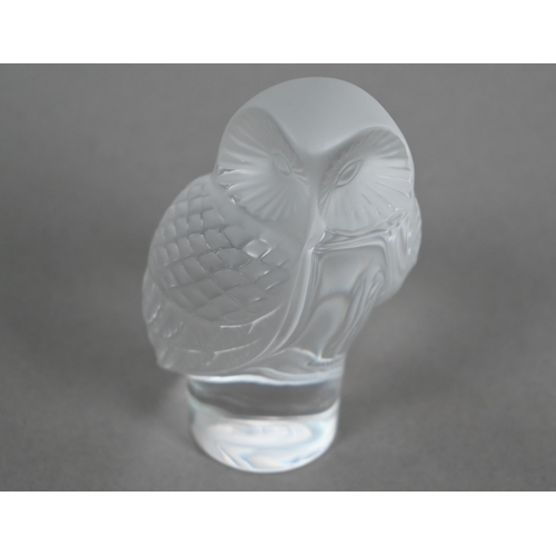 549 - A Lalique glass owl, engraved script 'Lalique ® France', 9cm