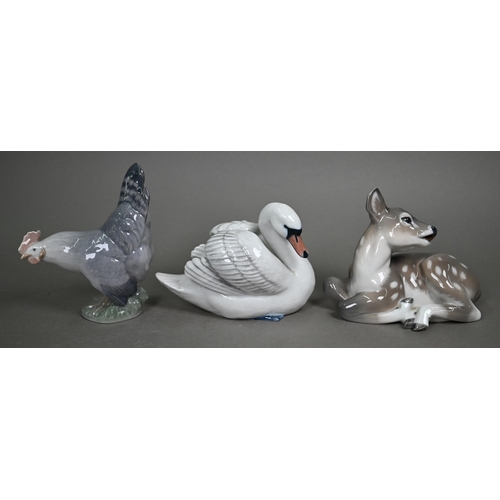 559 - A Royal Copenhagen 502 Salmon, 1024 Chicken, 359 Swan, 2609 Fawn, 3140 Dachshund and 1238/1408 Rolli... 