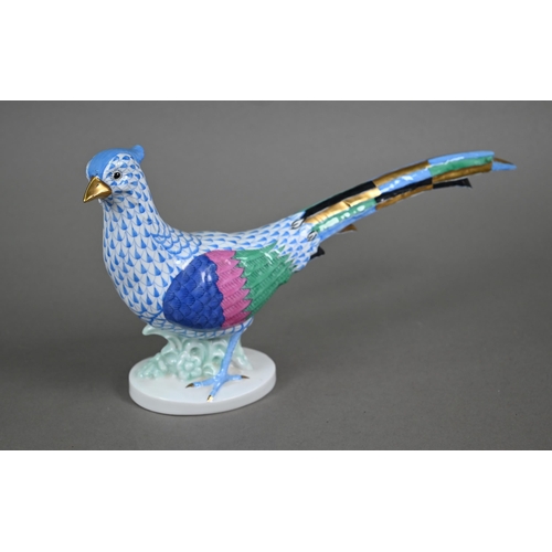 561 - A Herend (Hungary) porcelain pheasant, painted with blue scale, 17 x 32 cm