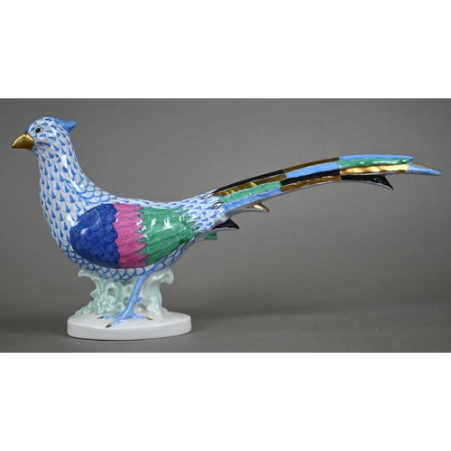 561 - A Herend (Hungary) porcelain pheasant, painted with blue scale, 17 x 32 cm