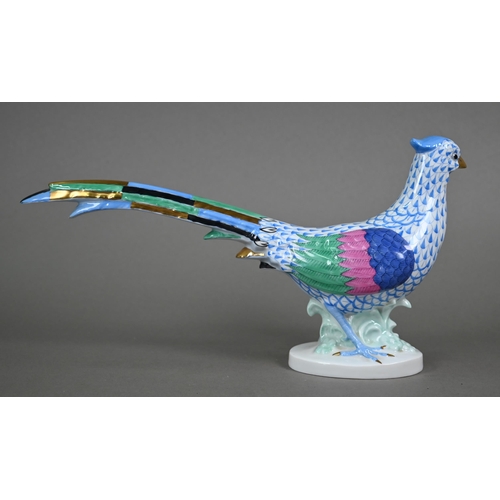 561 - A Herend (Hungary) porcelain pheasant, painted with blue scale, 17 x 32 cm