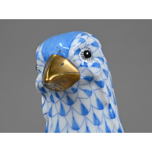 561 - A Herend (Hungary) porcelain pheasant, painted with blue scale, 17 x 32 cm