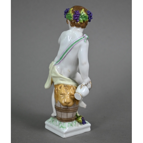 567 - A Berlin KPM porcelain figure of a Bacchanalian putto, 16 cm high, to/w a Limoges Rose et Guillard A... 