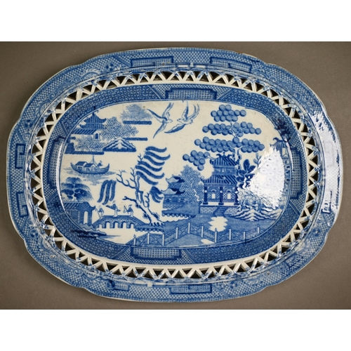 578 - A scarce pair of 18th century Luxembourg pottery 22 cm plates, the pierced basket-work rims with spa... 