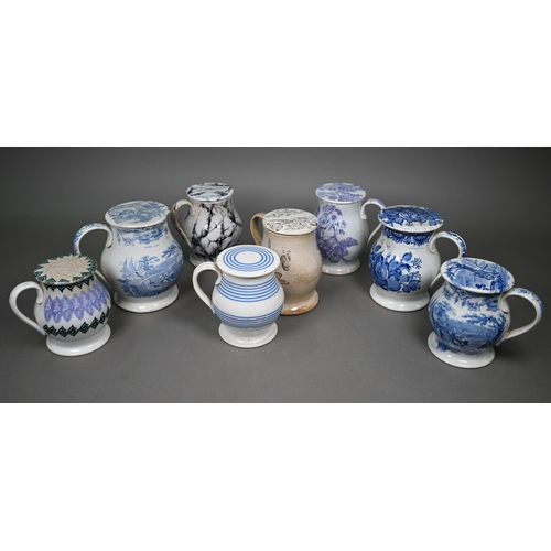 580 - Eight 19th century pottery treacle jars with screw tops, four with blue and white transfer-printed d... 