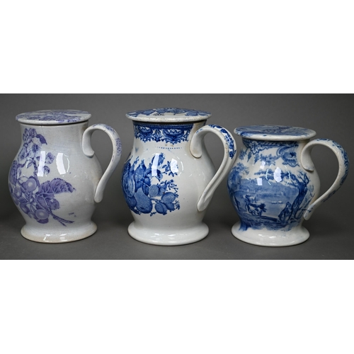 580 - Eight 19th century pottery treacle jars with screw tops, four with blue and white transfer-printed d... 