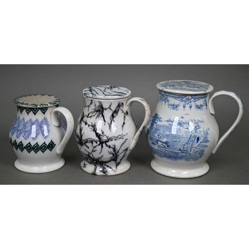 580 - Eight 19th century pottery treacle jars with screw tops, four with blue and white transfer-printed d... 