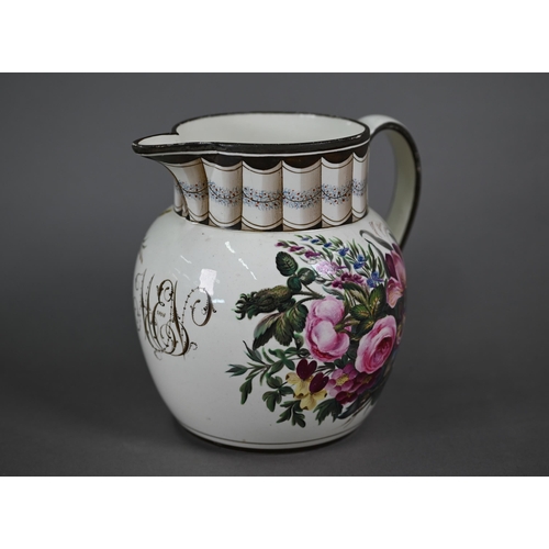 581 - A Regency creamware jug with trompe l'oeuil pleated neck above 'MEN' monogram dated 1808, flanked by... 