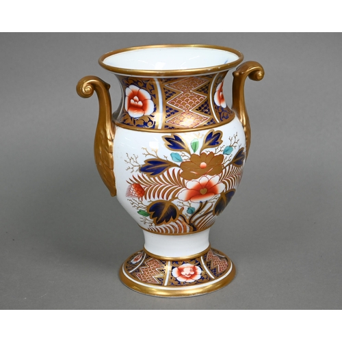 584 - An early 19th century Spode china vase with twin scroll handles, decorated in the Imari palette with... 