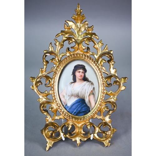 589 - A German porcelain oval plaque painted with Medea after Sichel, 12 x 9 cm, in ornate giltwood Floren... 