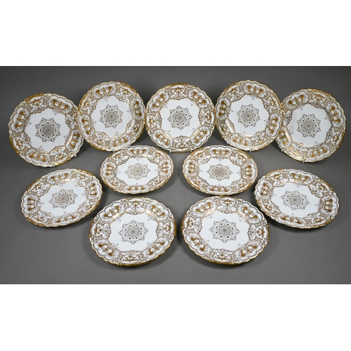 592 - A set of eleven Edwardian Coalport china 22.5 cm plates, finely gilded with cornucopiae, scrolls, fo... 