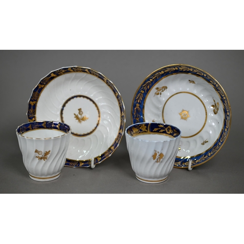 597 - A matched set of ten Worcester 'Flight & Barr' period tea cups and saucers with writhen reeding ... 