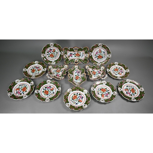 599 - A Regency Patent Ironstone china fruit service, printed, painted and gilded with floral designs with... 