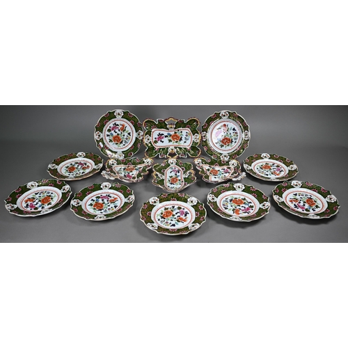 599 - A Regency Patent Ironstone china fruit service, printed, painted and gilded with floral designs with... 