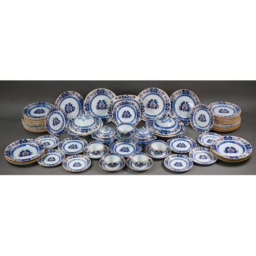 600 - A late Victorian Minton pottery dinner service, printed and painted with blue and iron-red floral de... 