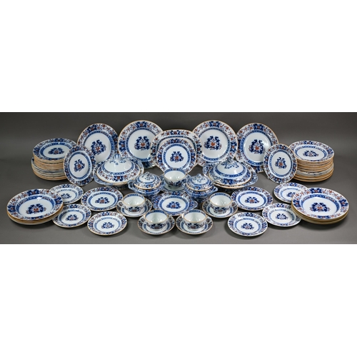 600 - A late Victorian Minton pottery dinner service, printed and painted with blue and iron-red floral de... 