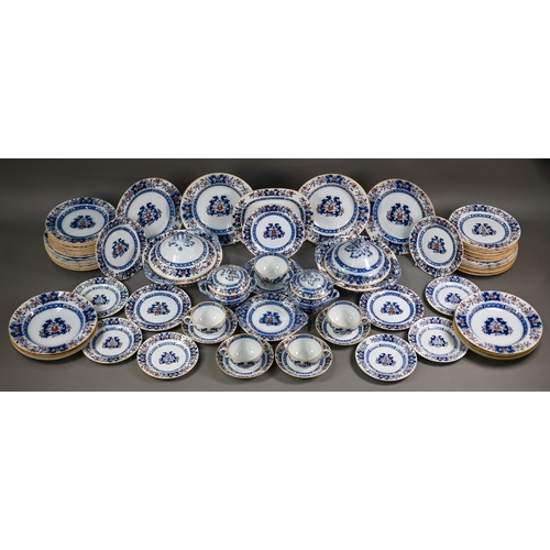 600 - A late Victorian Minton pottery dinner service, printed and painted with blue and iron-red floral de... 