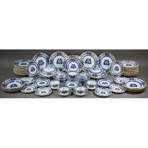 600 - A late Victorian Minton pottery dinner service, printed and painted with blue and iron-red floral de... 