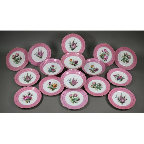 601 - A Victorian china fruit service with floral specimen painted centres with pink and gilt borders, com... 