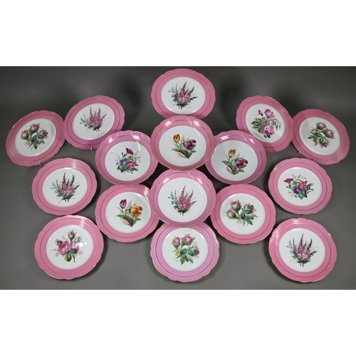 601 - A Victorian china fruit service with floral specimen painted centres with pink and gilt borders, com... 